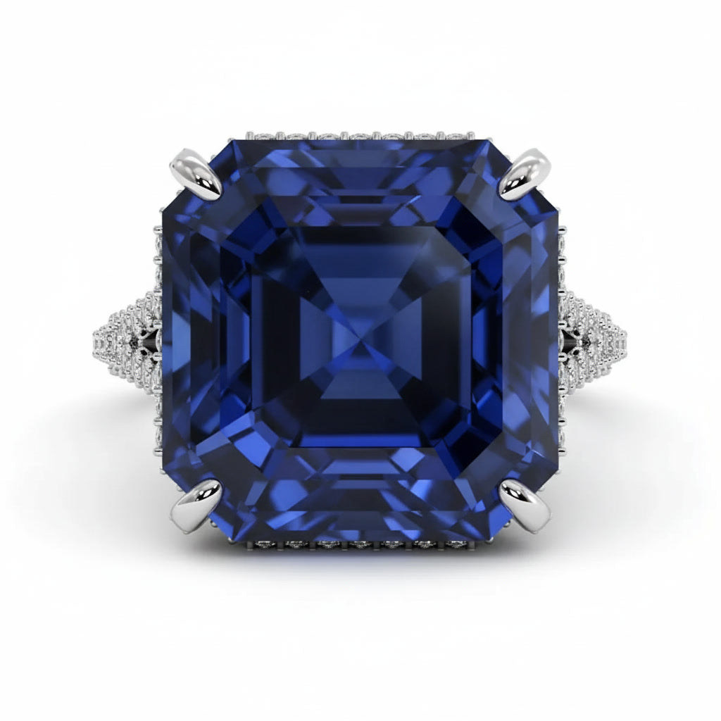 Close up of ink blue Asscher cut sapphire center stone in Monumental ring